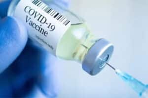 Assurance maladie et effets secondaires du vaccin Covid